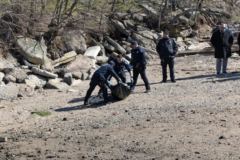 NYPD ESU officers responding to a report of a floater/body on the rocks at Coney Island Creek.
