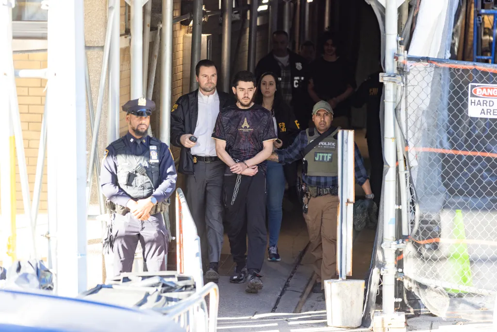 NYPD and the FBI transport Emir Balat and Ibrahim Kayumi from the 26th precinct on Monday morning, march 9, 2026.