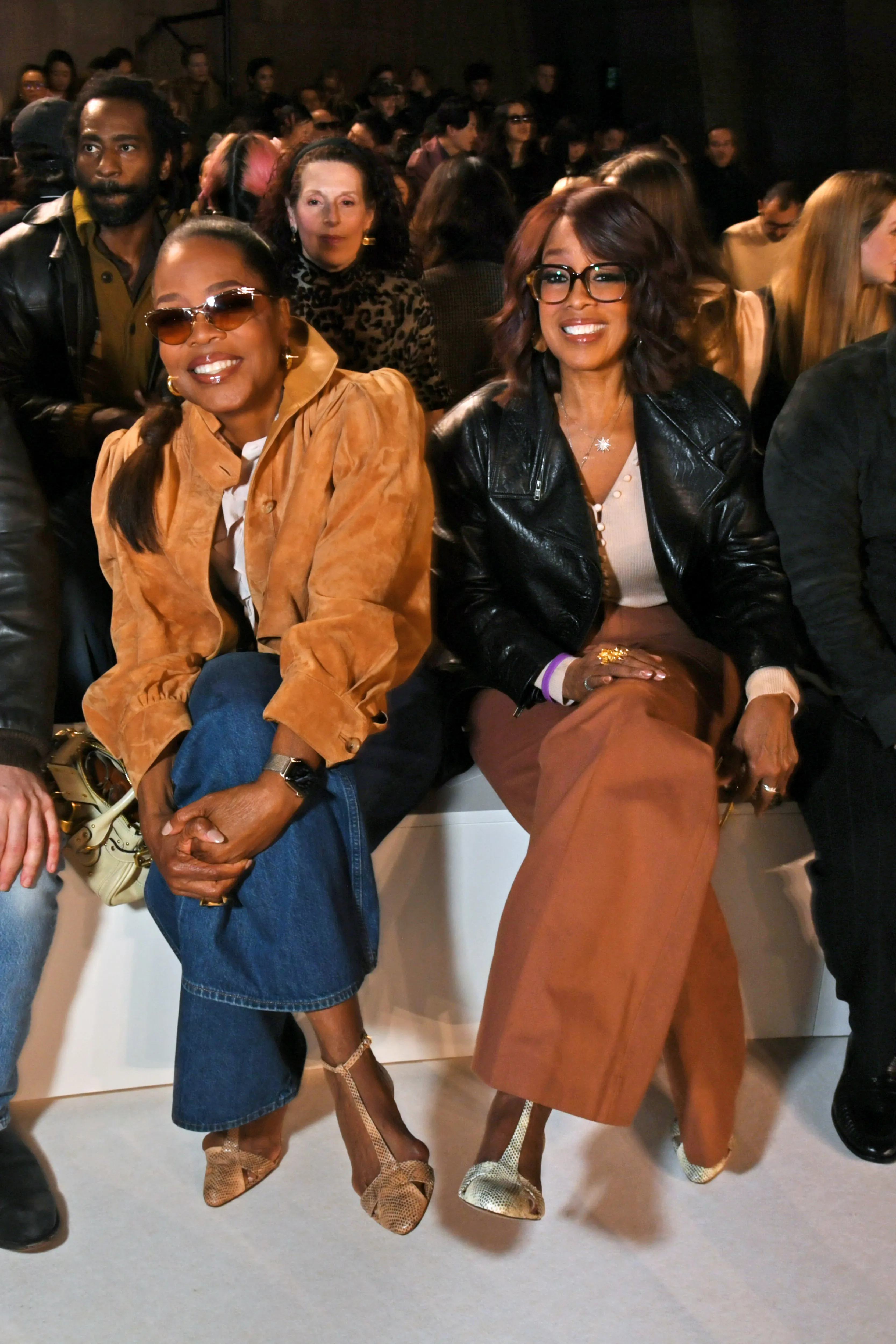 Oprah Winfrey and Gayle King sitting front row at Paris Fashion Week.