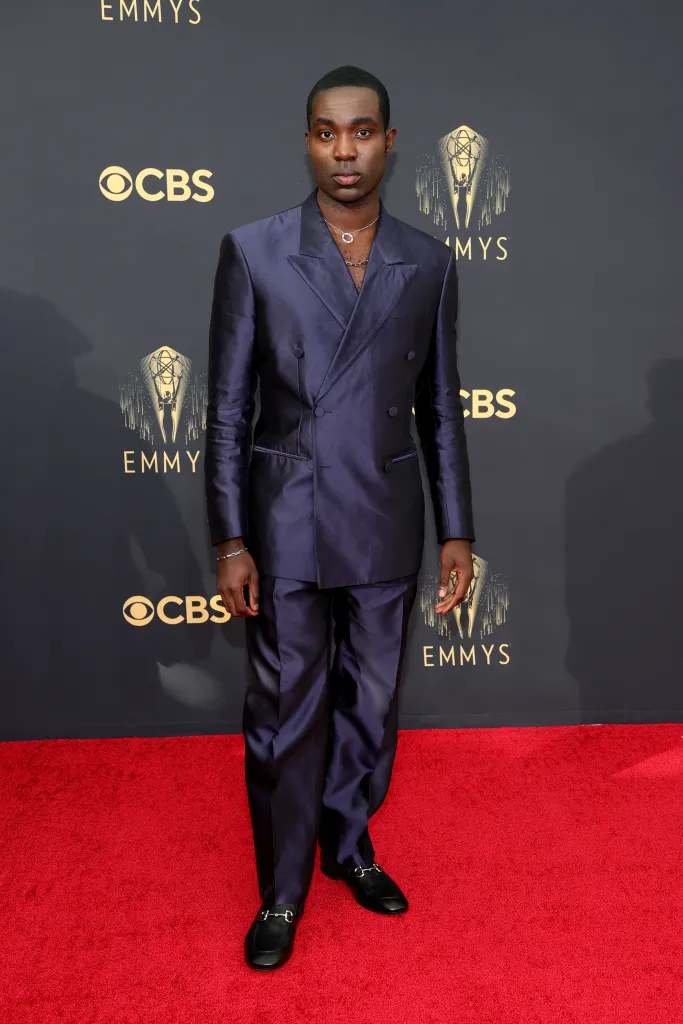 Paapa Essiedu in a purple suit on the red carpet at the 73rd Primetime Emmy Awards.