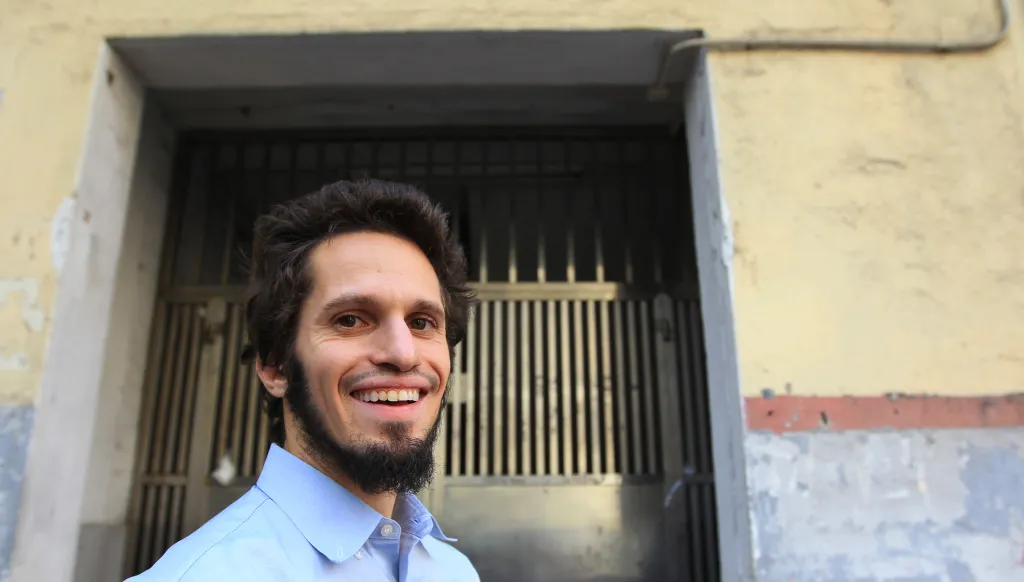 Patri Friedman smiling for a photo after a talk about building mini island nations.