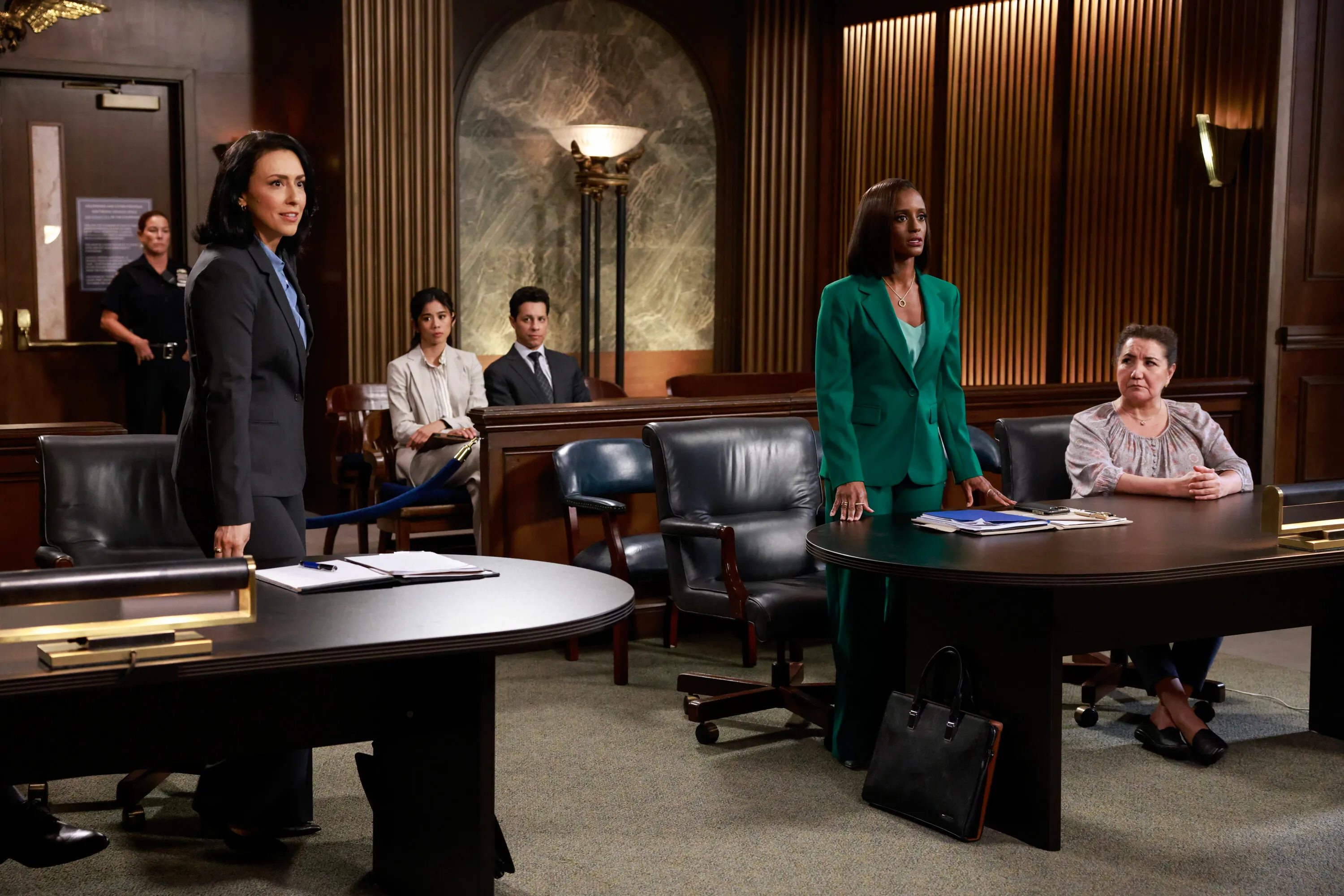 Sarah Franklin (Leah Lewis), Billy Martinez (David Del Rio), and Olympia Lawrence (Skye P. Marshall) appear in a courtroom drama scene.