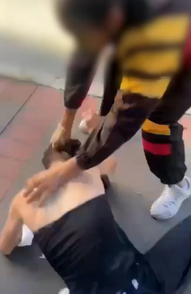 Mobile phone footage of the brawl at Mount Druitt bus interchange shows the victim being punched to the ground and repeatedly kicked in the head by at least four older girls wearing school uniforms.