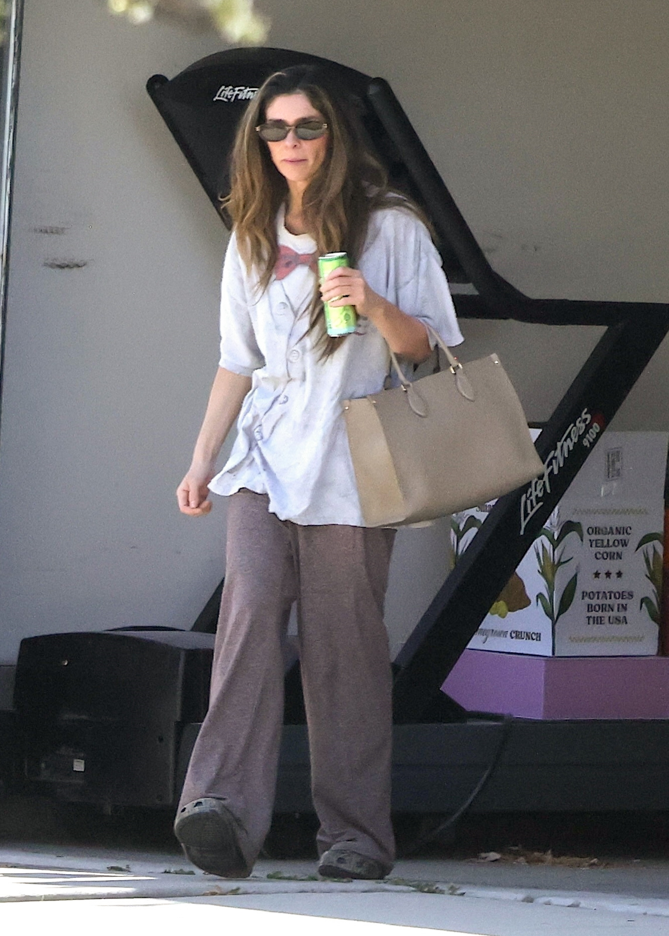 Taylor Frankie Paul, a social media personality, walks down a street in Utah.