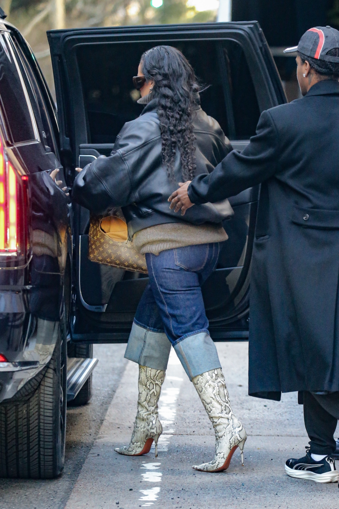 Rihanna in a black leather jacket, jeans, and snakeskin boots, accompanied by A$AP Rocky, getting into a car.