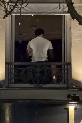 Damson Idris and Lori Harvey embraced passionately in a window at an after-party in Paris.