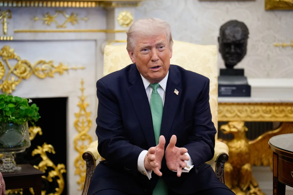 Donald J. Trump speaking to the press in the Oval Office.