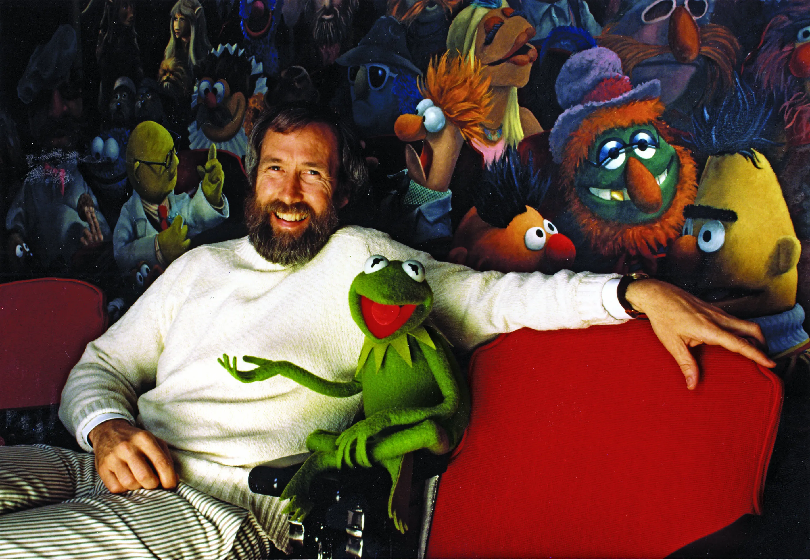 American puppeteer and filmmaker Jim Henson (1936-1990) with some of the Muppet cast 