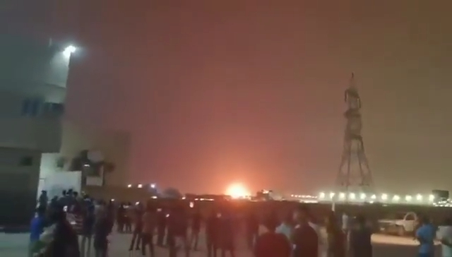 Fire and smoke rising from QatarEnergy’s Ras Laffan Industrial City.