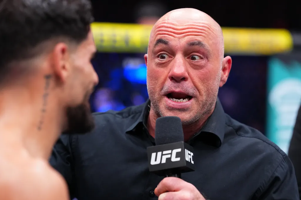 Joe Rogan interviews Alberto Montes following a featherweight fight during the UFC 326 event.