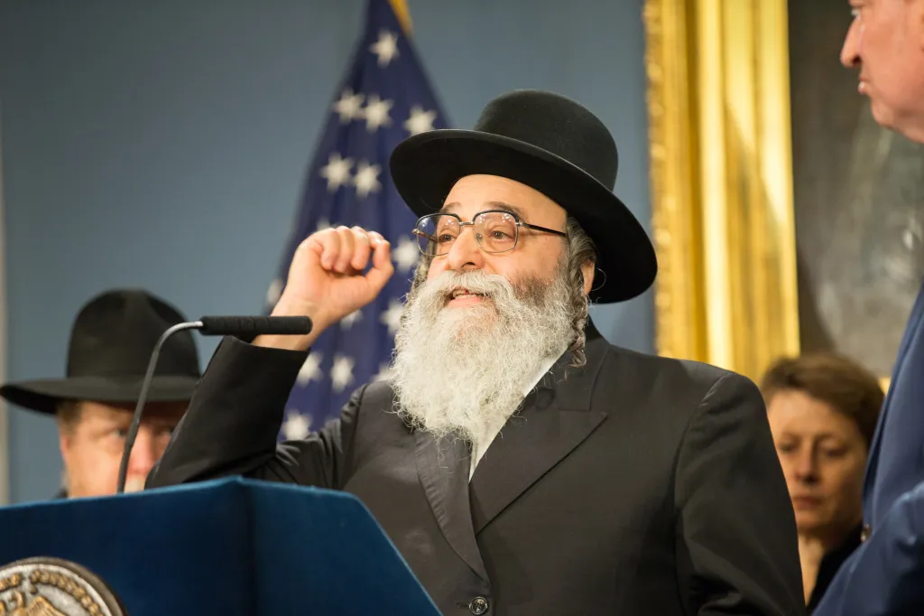 Rabbi David Niederman speaking at City Hall.