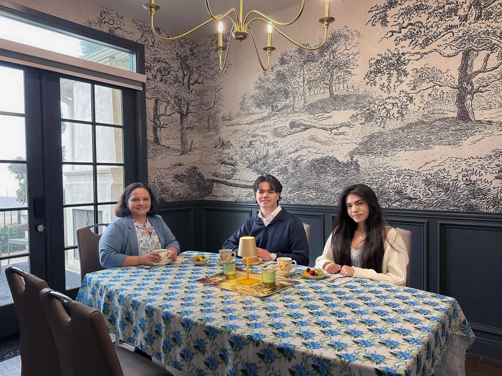 Jenny Wallace, a realtor, with her two children at their home in Texas.