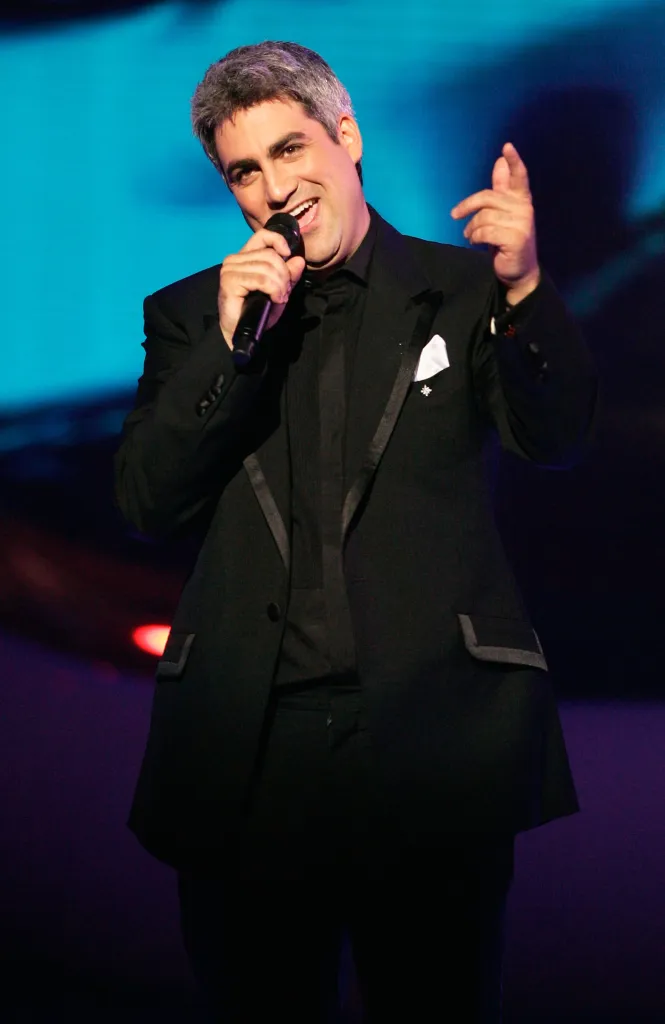 Taylor Hicks performing on stage at the American Idol Season 5 Finale.