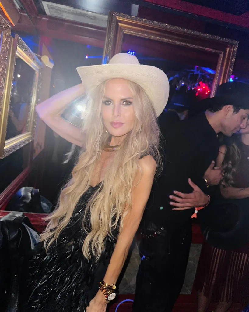 Rachel Zoe poses at a party.
