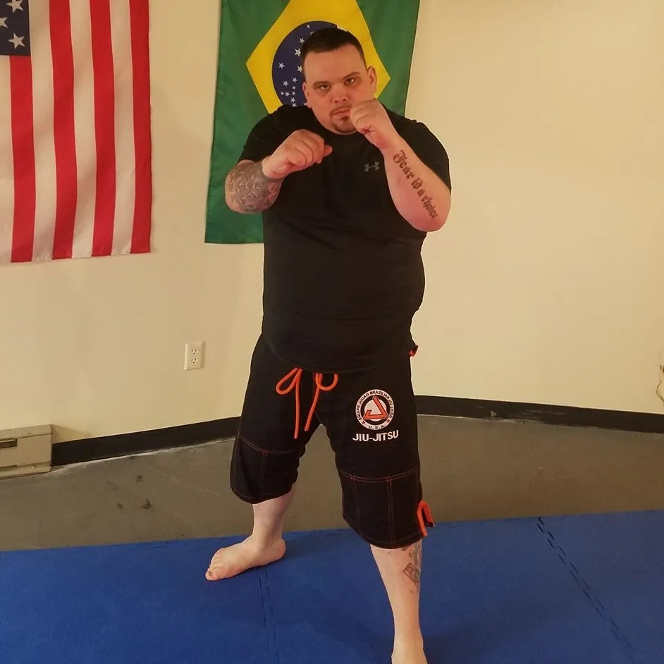 buskey in a fighting stance with his fists up