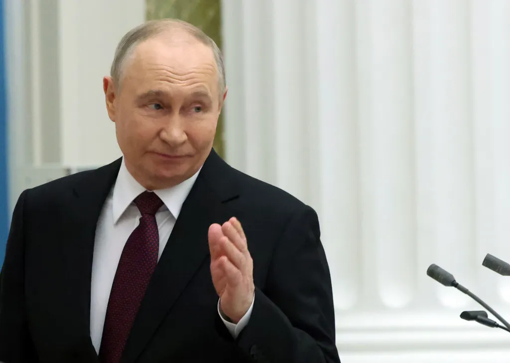 ussian President Vladimir Putin gestures during an awards ceremony at the Kremlin, on March 19, 2026 in Moscow, Russia