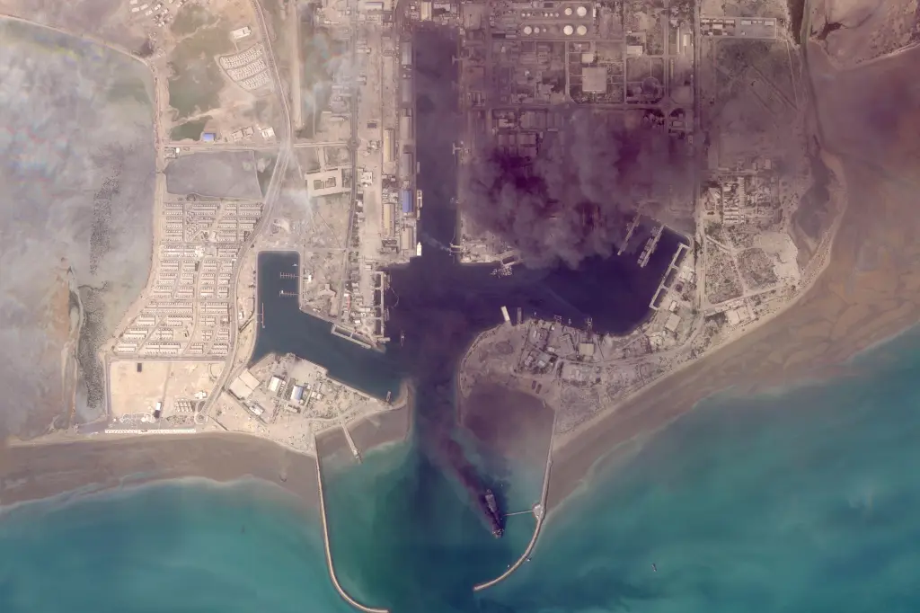 This satellite image from Planet Labs PBC shows fires burning on ships after a US military attack on a port in Bandar Abbas, Iran, March 2, 2026. 