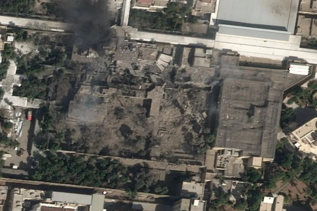 Black smoke rises from the heavy damage of Iranian Supreme Leader Ali Khamenei's compound in Tehran after US and Israeli strikes on Feb. 28, 2026.