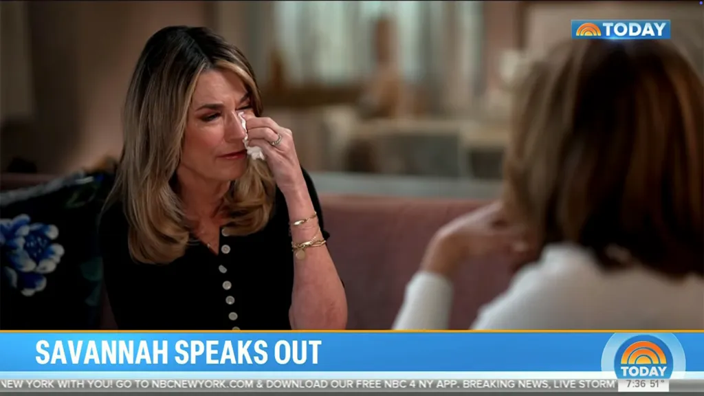 Savannah Guthrie crying and wiping her eyes with a tissue during an interview on the Today show.