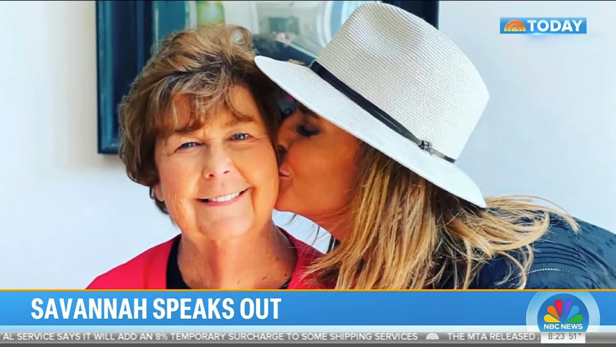Savannah Guthrie kissing an older woman on the cheek.