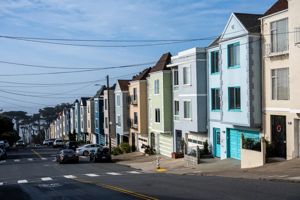 Residential homes lining a street in San Francisco, California.