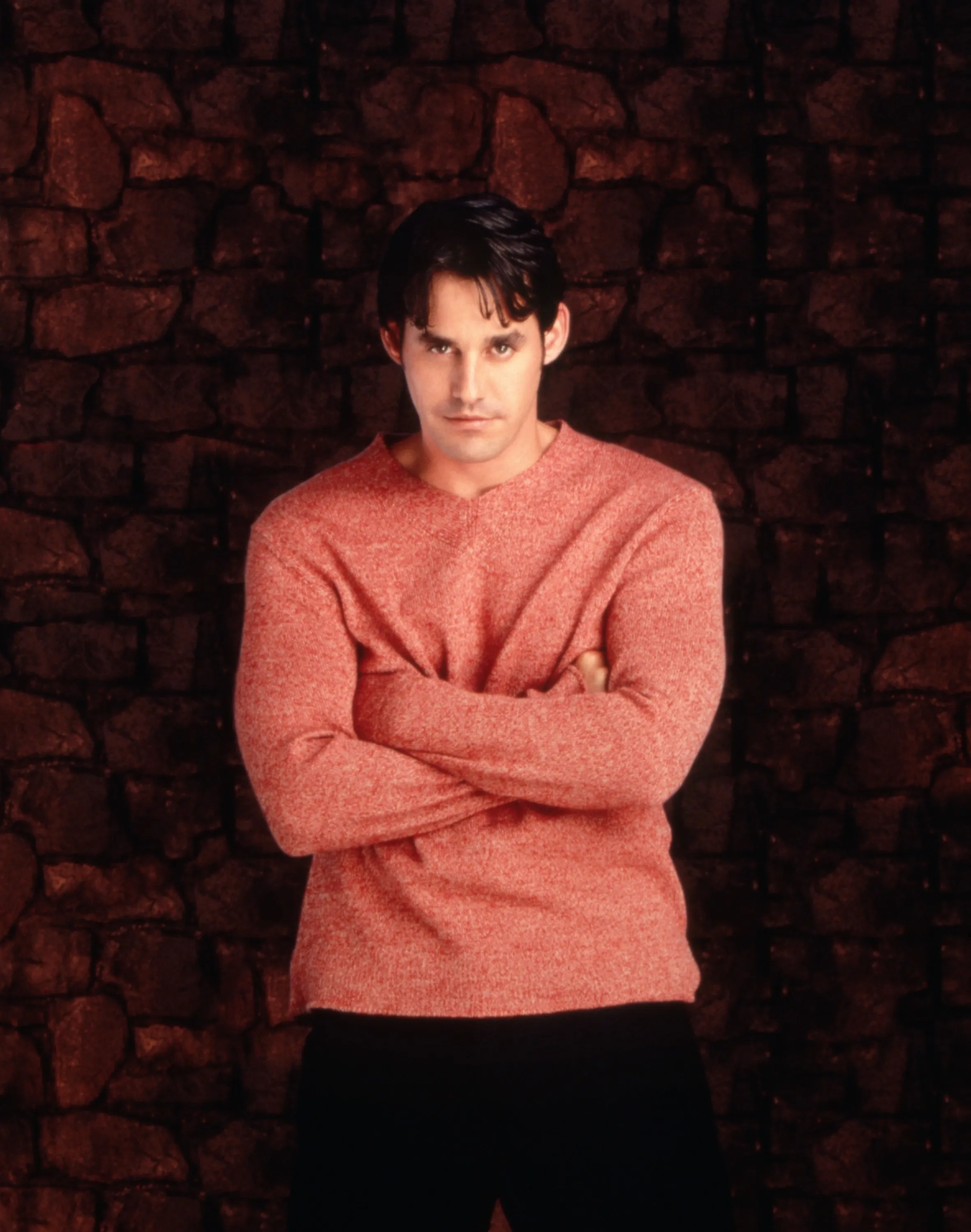 Nicholas Brendon with arms crossed.