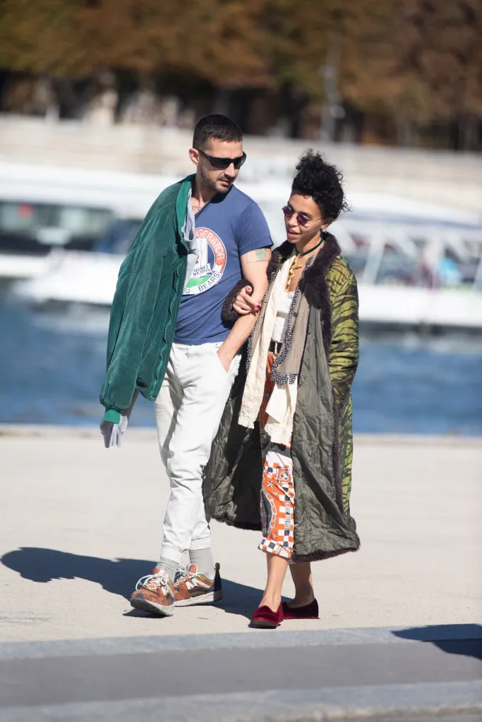 Shia LaBeouf and FKA Twigs walking together in Paris.