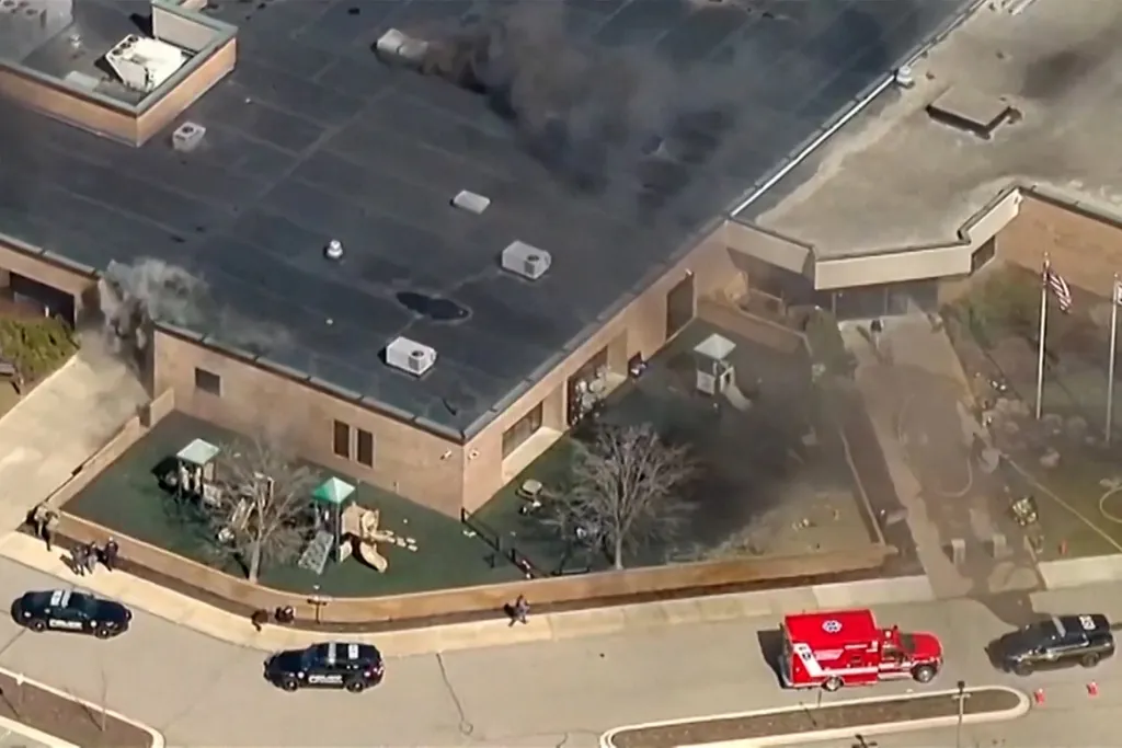 Aerial view of smoke rising from the Temple Israel Synagogue in West Bloomfield after a reported active shooting incident.