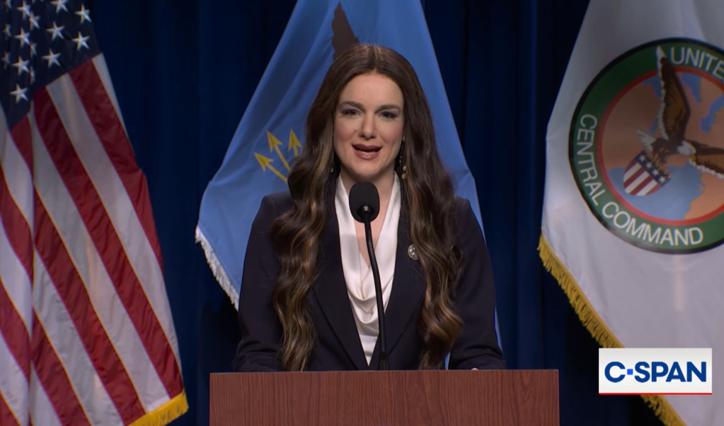 Comedian Ashley Padilla portrays Kristi Noem during 