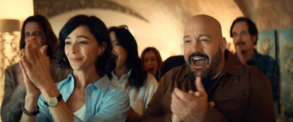 Nicole Grimaudo and Kevin James clapping with excitement.