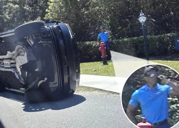 First photos of Tiger Woods at scene of rollover car crash shortly before DUI arrest revealed