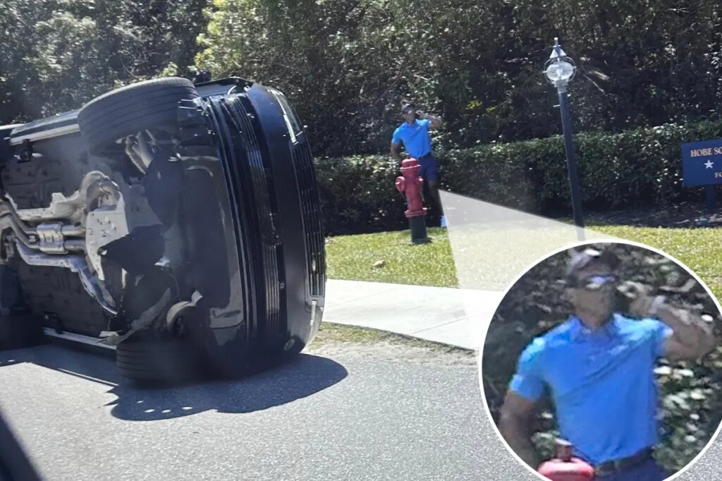 First photos of Tiger Woods at scene of rollover car crash shortly before DUI arrest revealed
