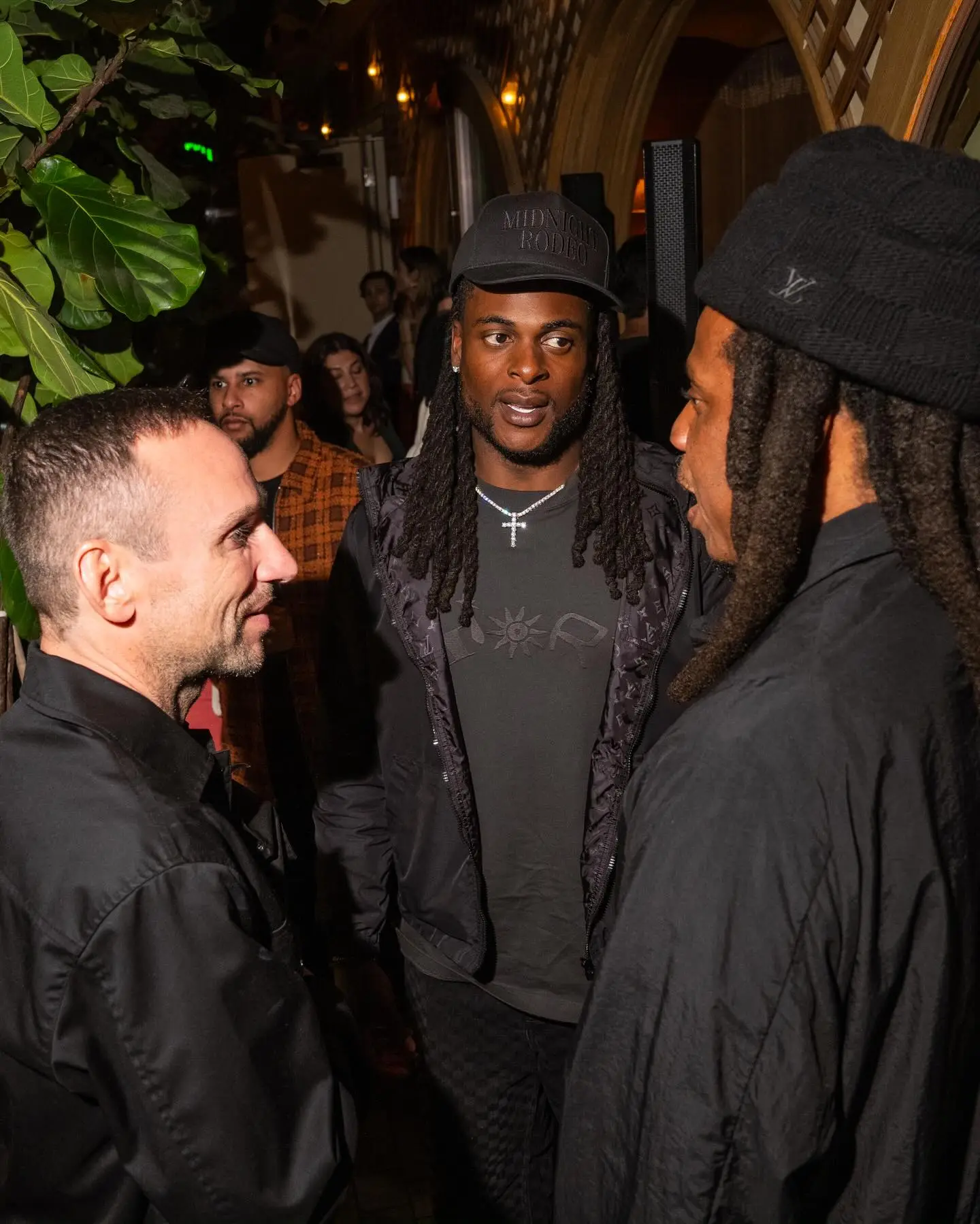 Jay-Z chatting with guests.