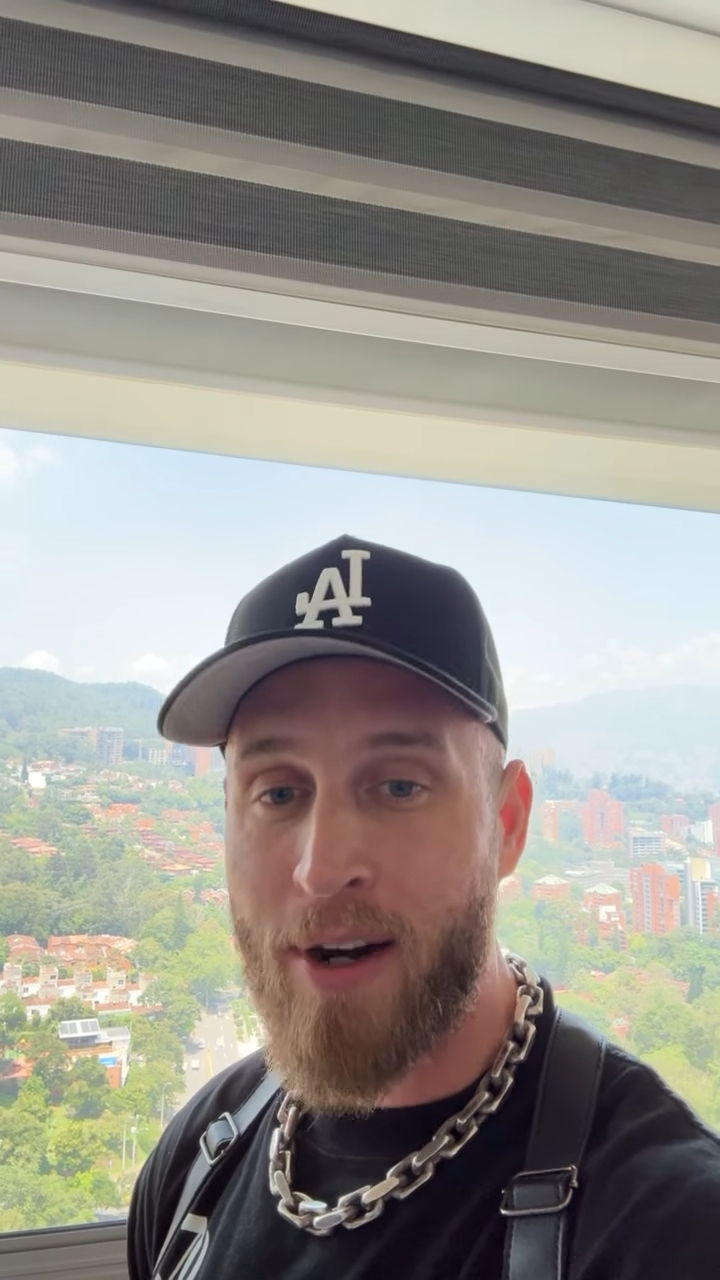 Chet Hanks, son of Tom Hanks, wearing a black cap with an 