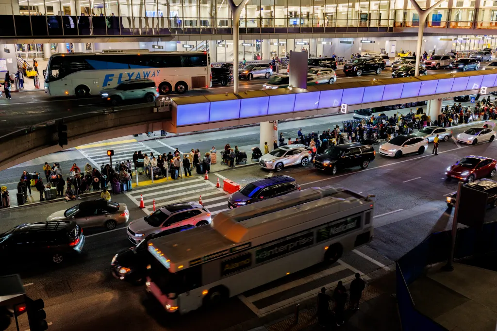 Holiday travelers and heavy traffic at Los Angeles International Airport (LAX).