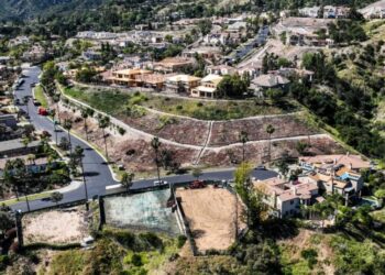 Sorry your house burned down. Here’s a $23,000 HOA bill — due next month