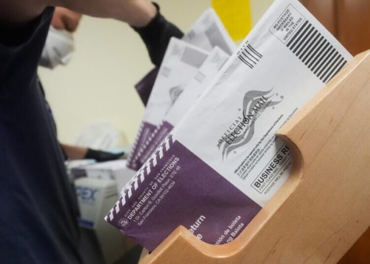 Trump signs executive order limiting mail-in ballots; California leaders say they’ll fight