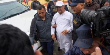 Nepal police arrest former prime minister over protest deaths