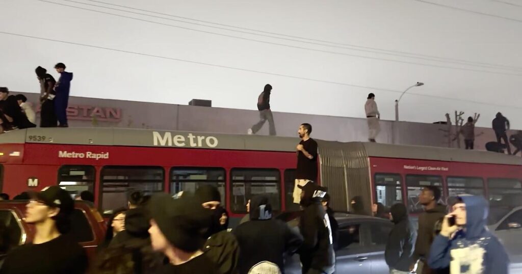 Metro bus, workers trapped amid one of three raucous L.A. street takeovers within 24 hours