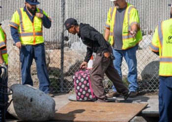 L.A. tries to close off manhole where people live, nearly sealing someone inside
