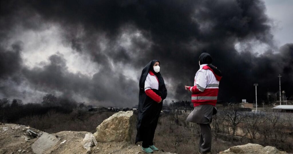 After attacks on Iran’s oil facilities, toxic black rain endangers the public