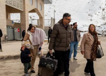 Iranians grapple with whether to flee the country because of the war