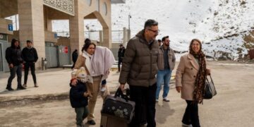 Iranians grapple with whether to flee the country because of the war