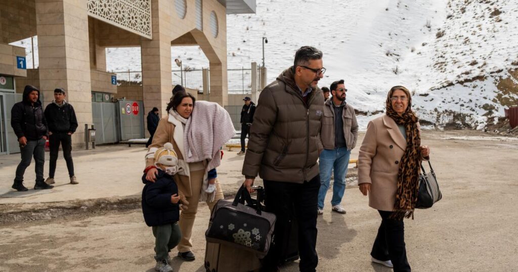 Iranians grapple with whether to flee the country because of the war