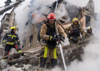 Russian missile hits apartment building in Ukraine, killing at least 10