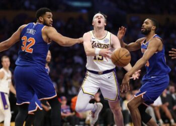 Luka Doncic and Austin Reaves carry LeBron-less Lakers to win over Knicks
