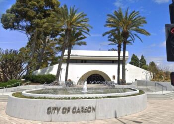He says Carson councilwoman asked him to mow her lawn and spy on colleague. City disputes his lawsuit