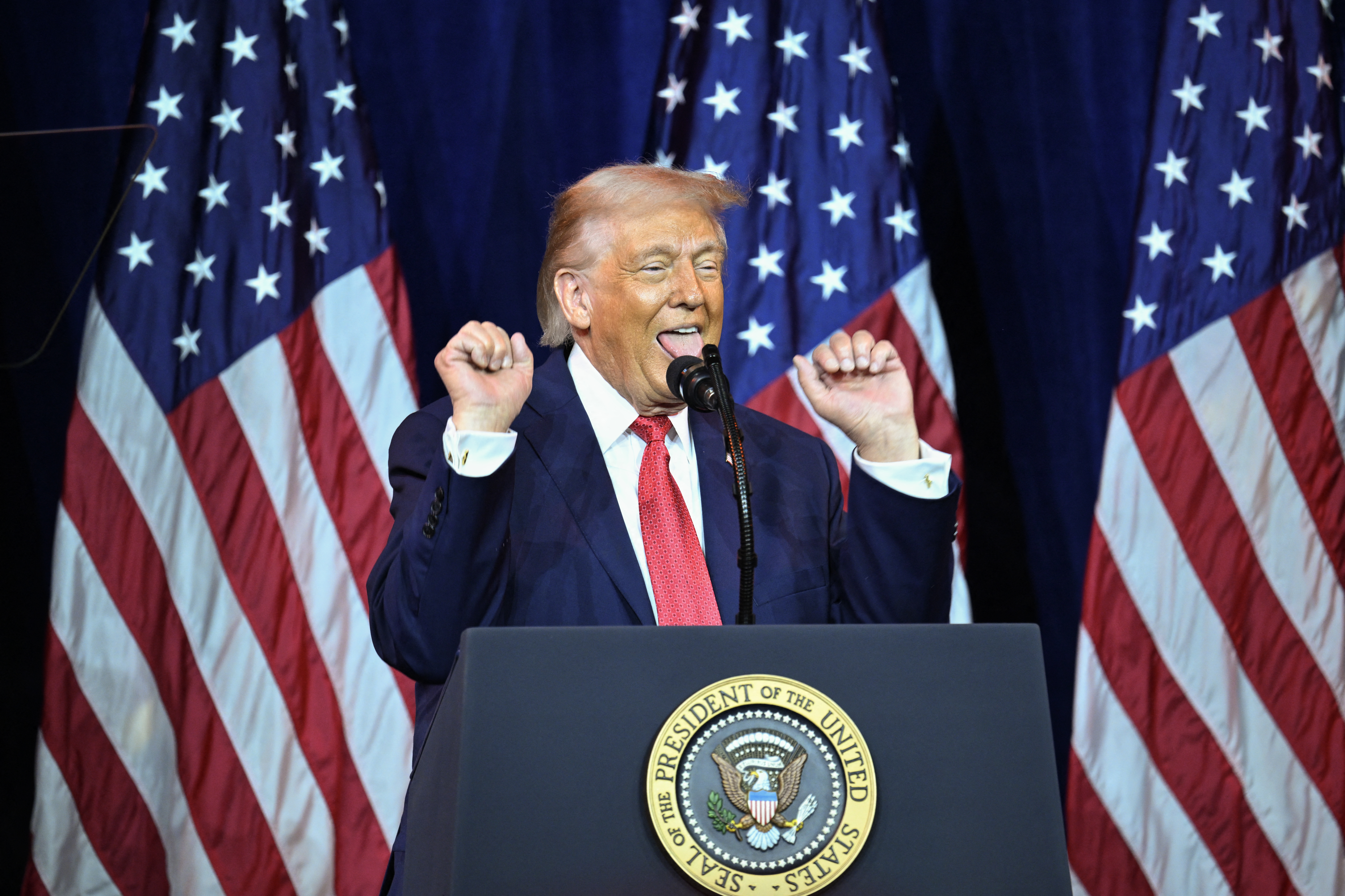 US President Donald Trump reacts as he speaks during the House Republican Party (GOP) member retreat at the Kennedy Center in Washington, DC, on January 6, 2026. (