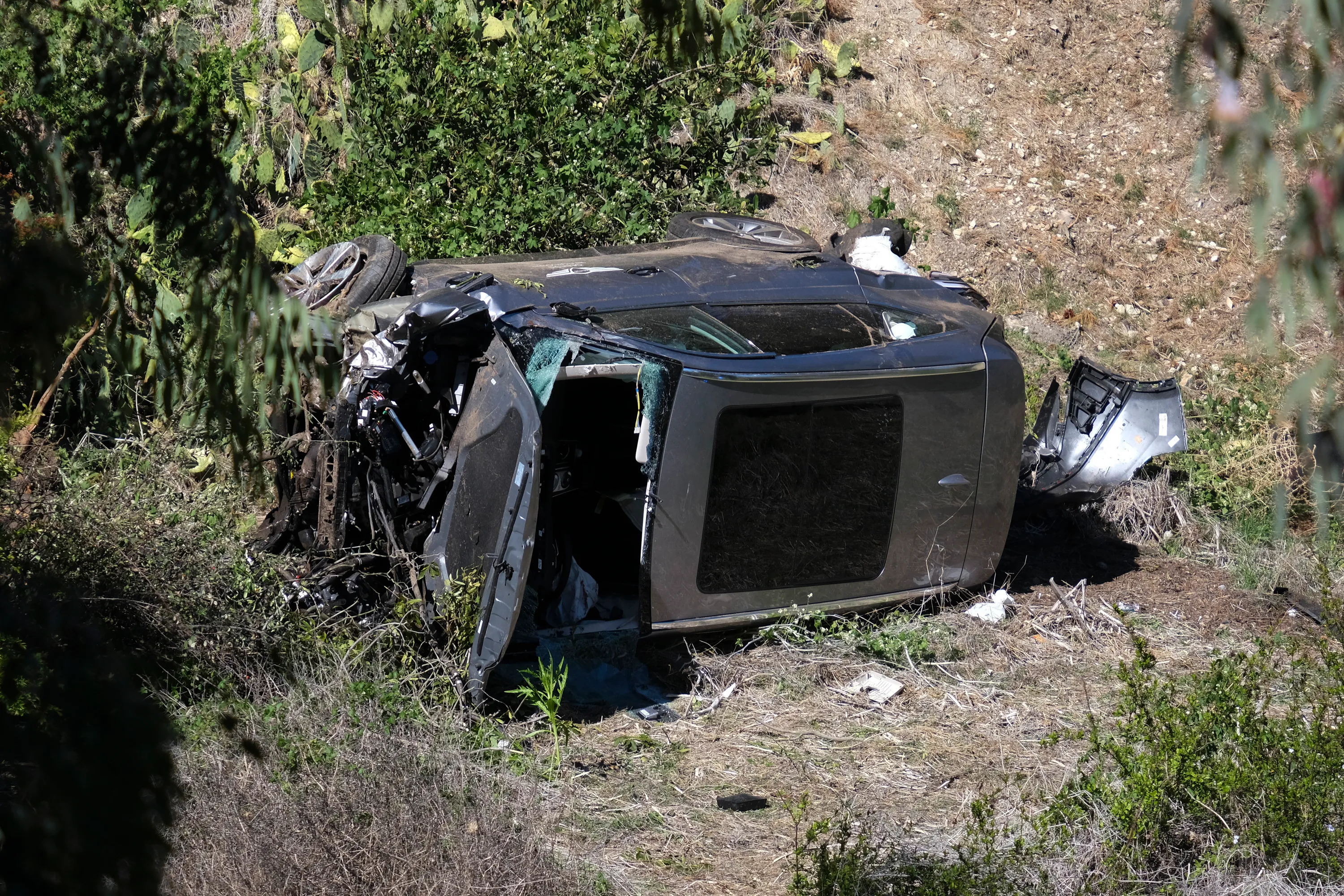 A vehicle rests on its side in Rancho Palos Verdes following a rollover accident involving golfer Tiger Woods.