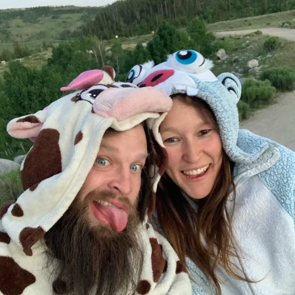Victoria Neidhardt and her husband Tyler Neidhardt wearing animal hats.